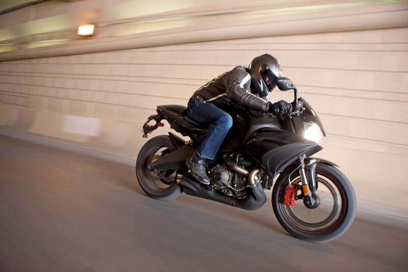 Motorcyclist riding in tunnel