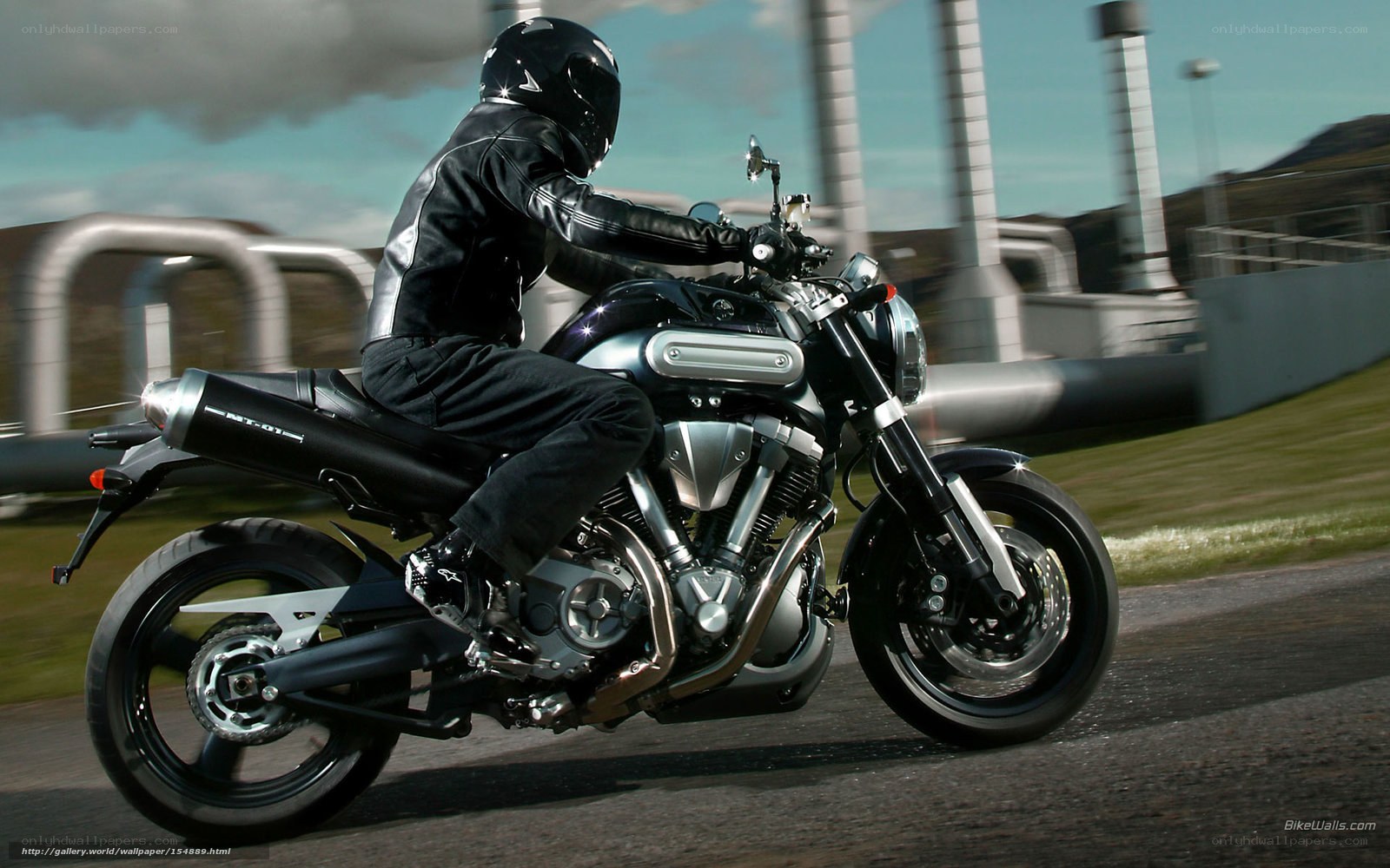 motorcyclist riding on a track