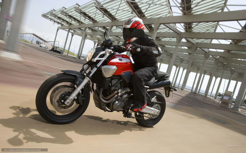 motorcyclist riding on a track