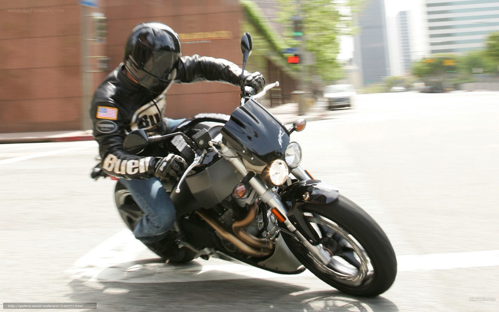 motorcyclist riding on city street