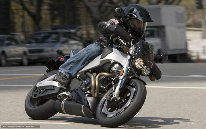 motorcyclist riding on city street