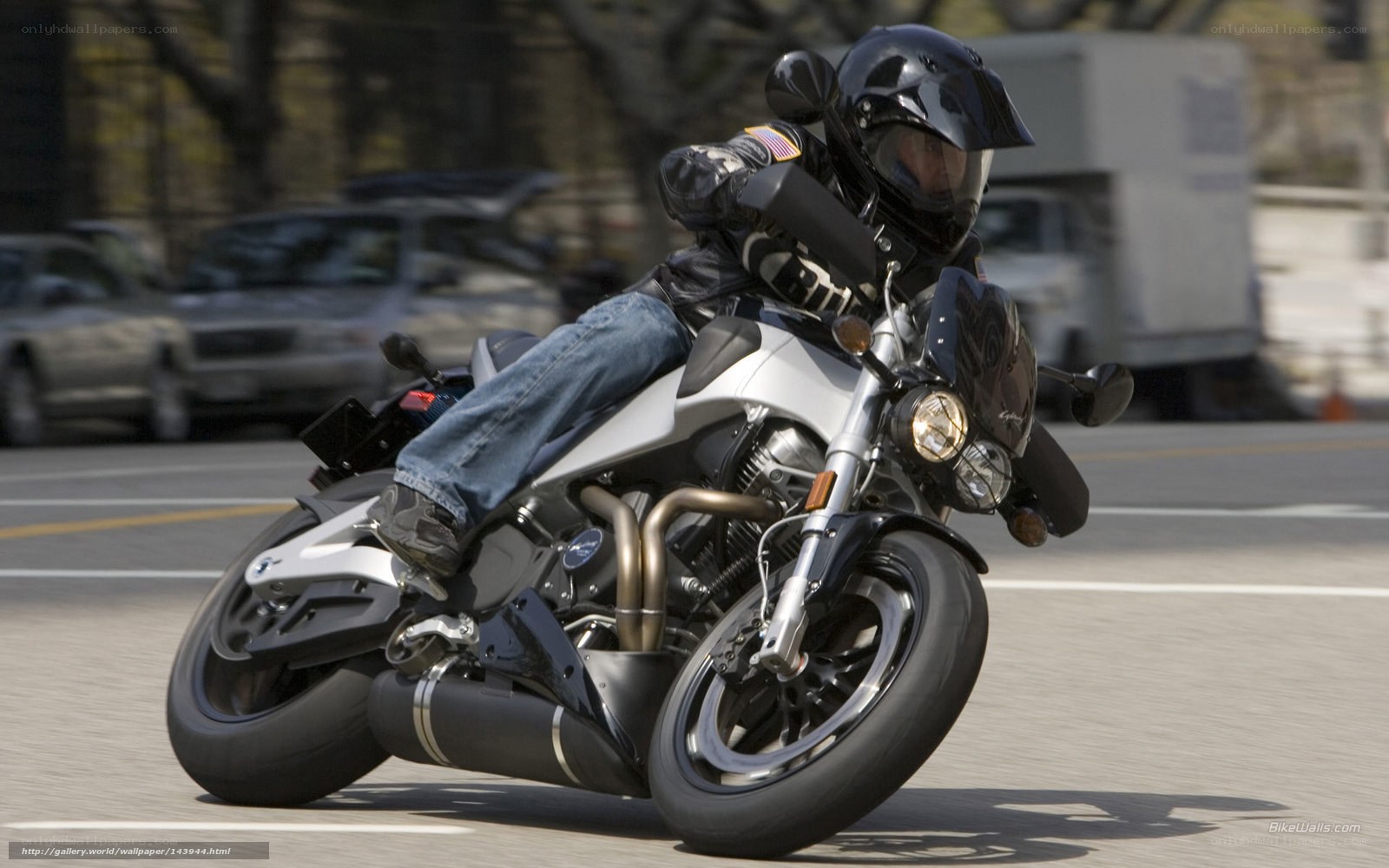 motorcyclist riding on city street