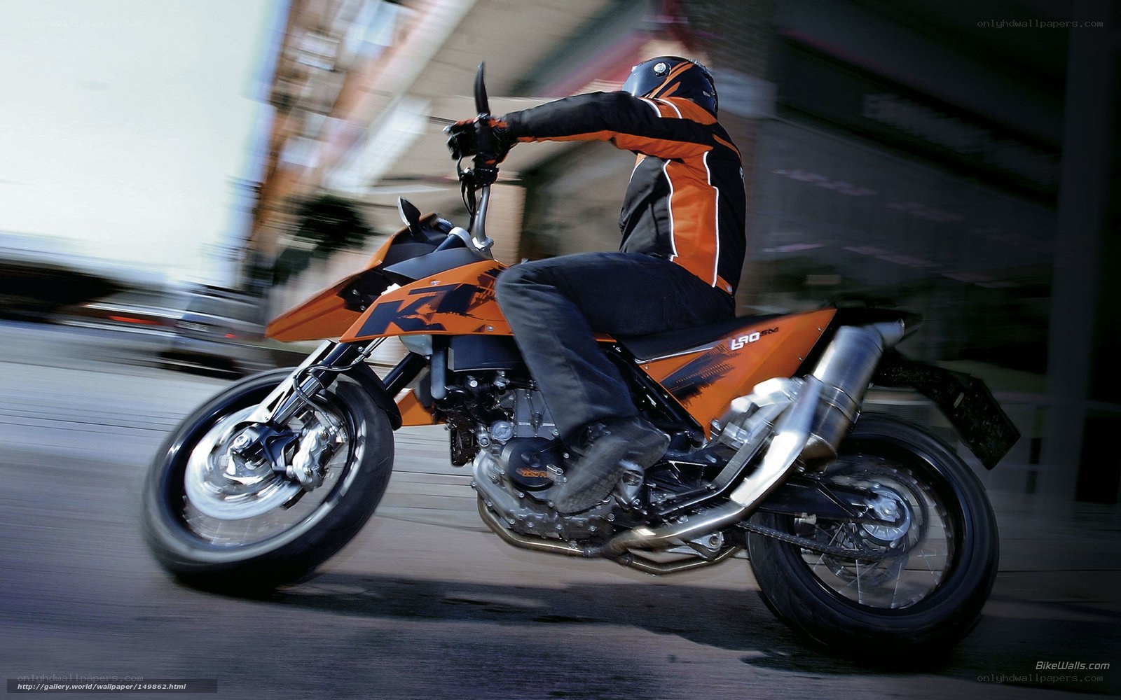 motorcyclist riding on city street