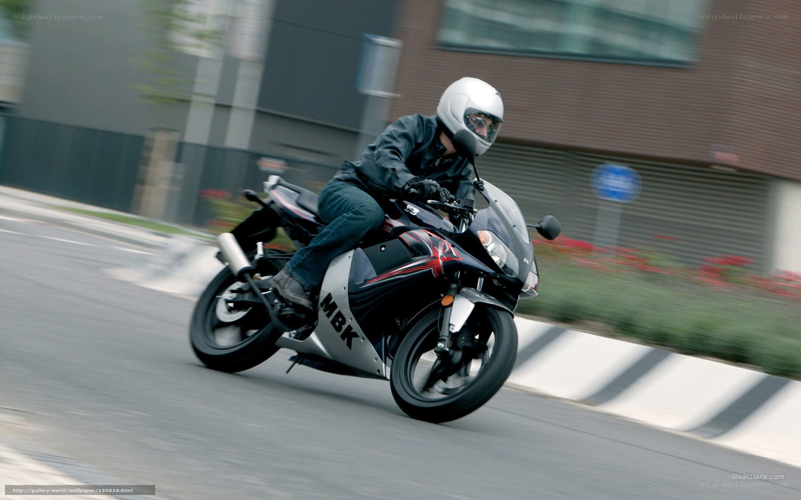 motorcyclist riding on city street