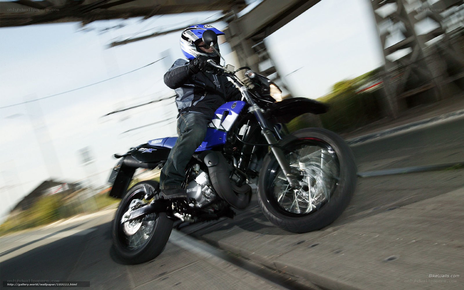 motorcyclist riding on city street