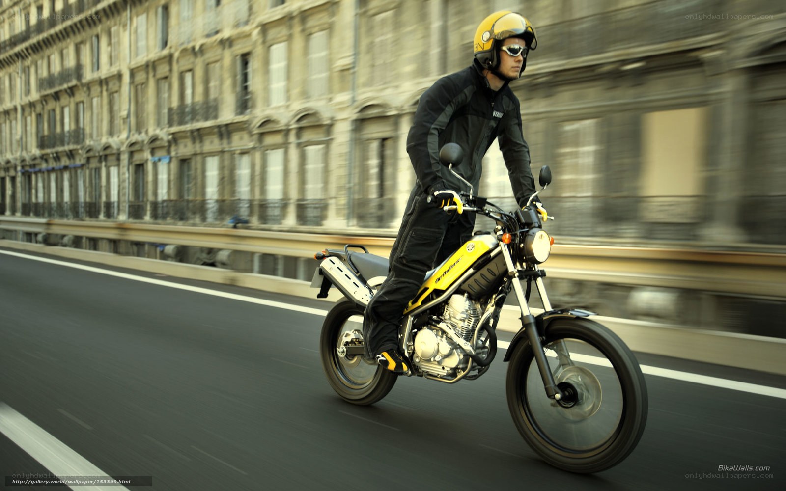 motorcyclist riding on city street