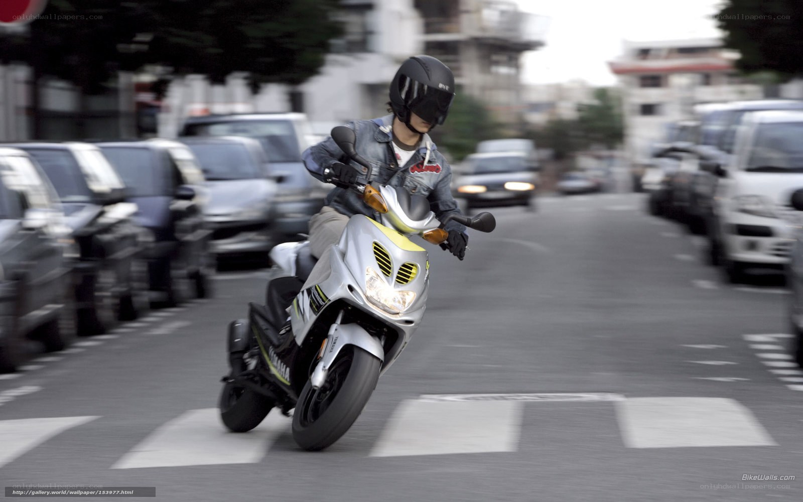 motorcyclist riding on city street