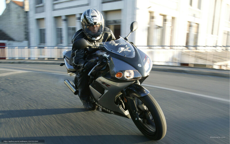 motorcyclist riding on city street