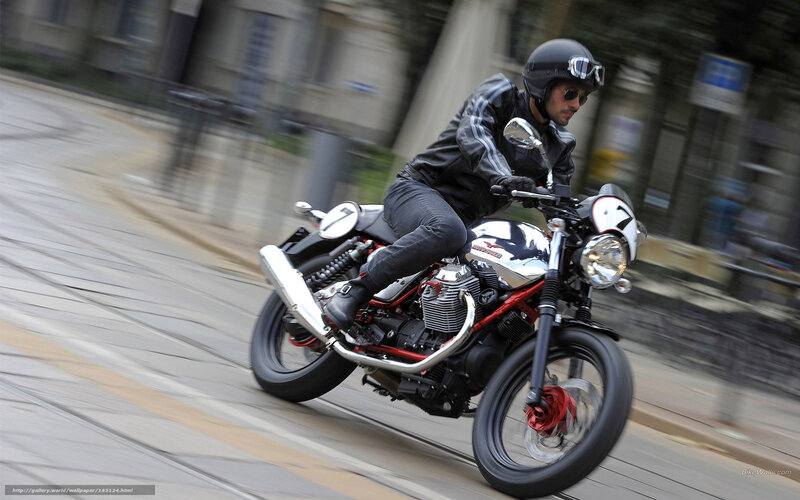 motorcyclist riding on city street