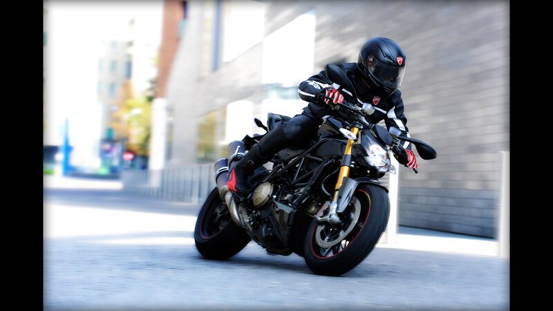 motorcyclist riding on city street