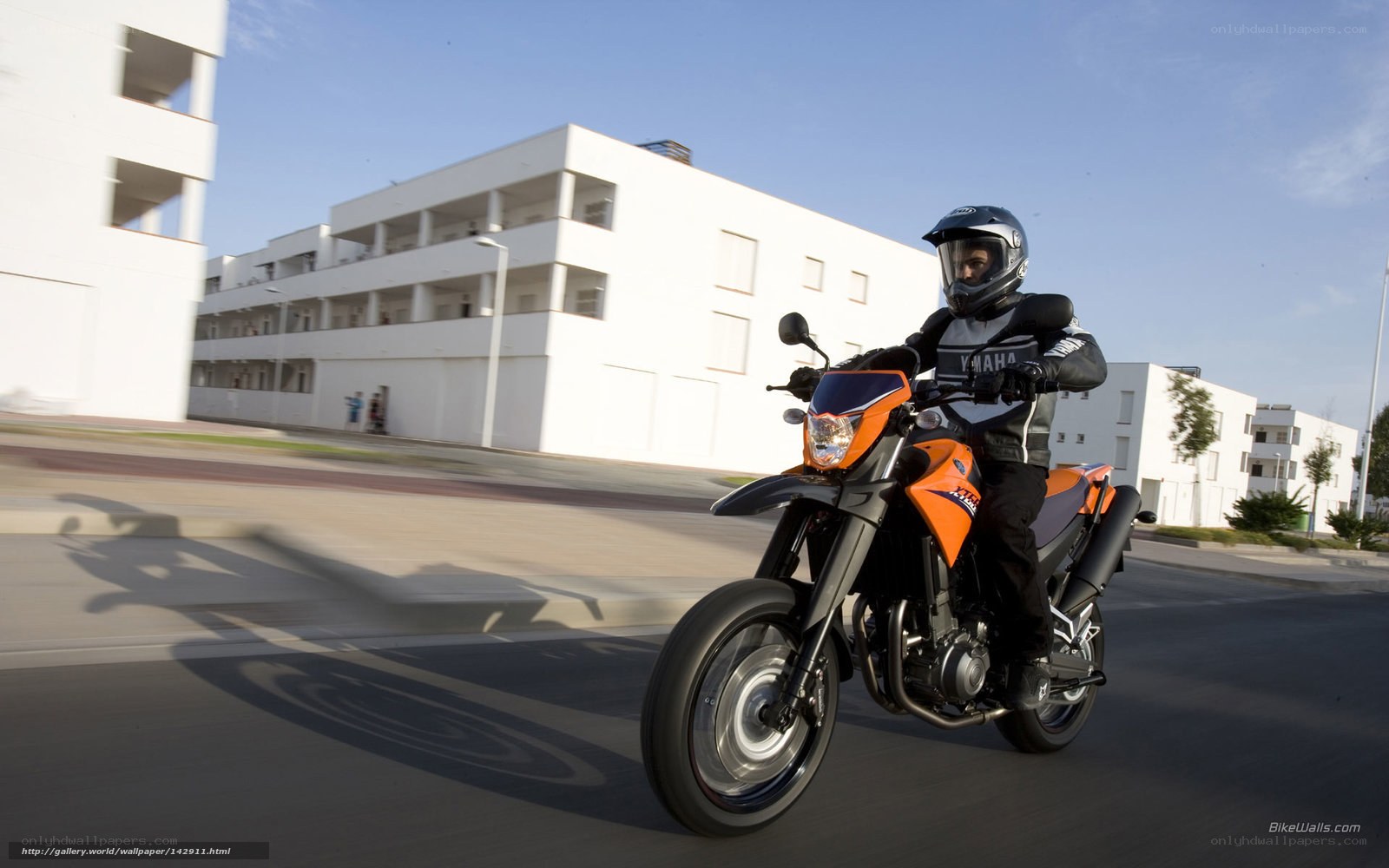motorcyclist riding on city street