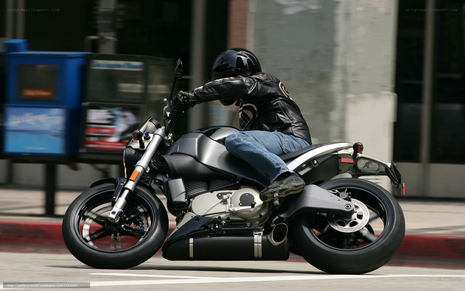 motorcyclist riding on city street