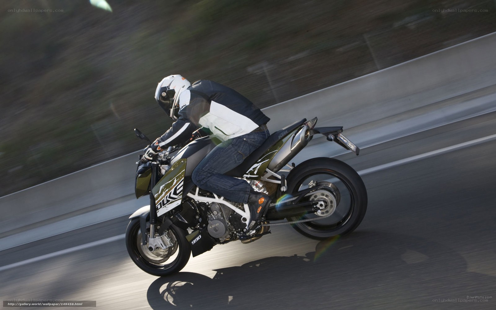 motorcyclist riding on highway