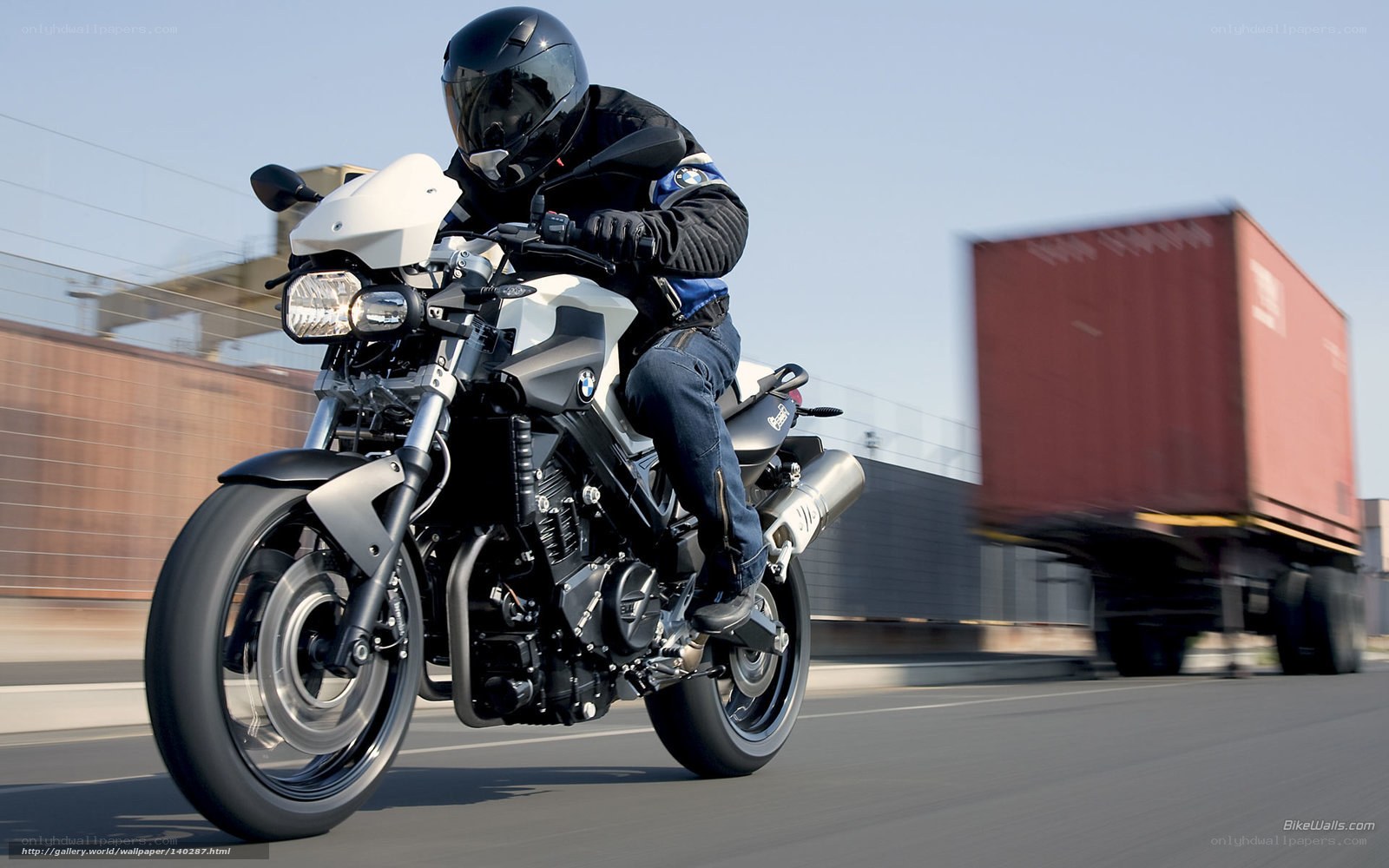 motorcyclist riding on highway
