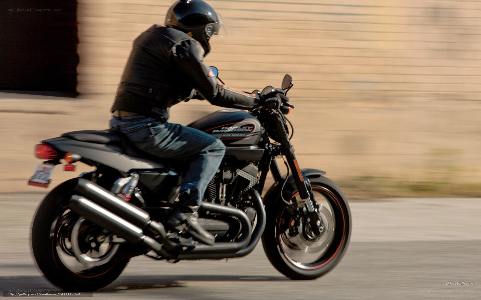 motorcyclist riding on road