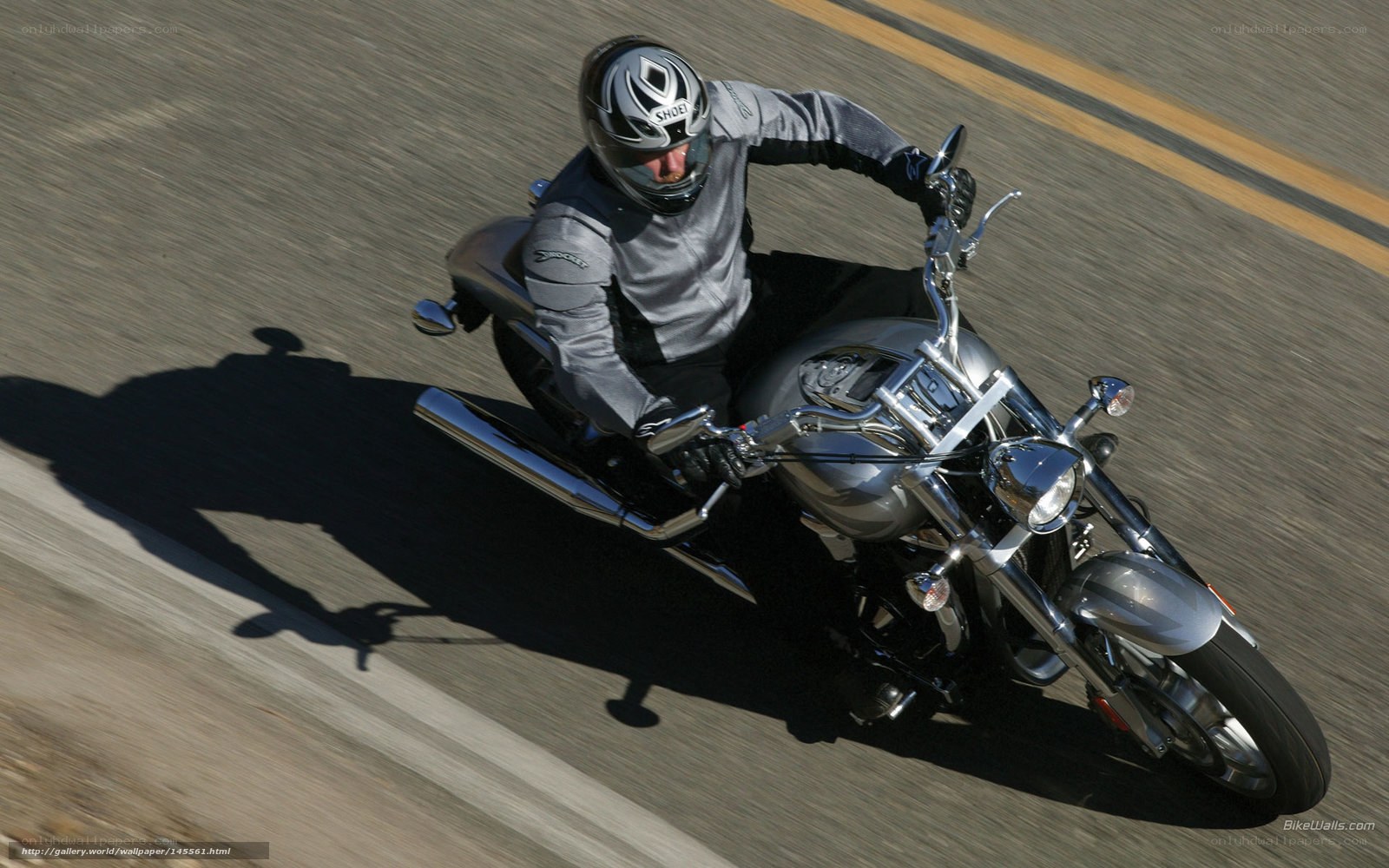 motorcyclist riding on road