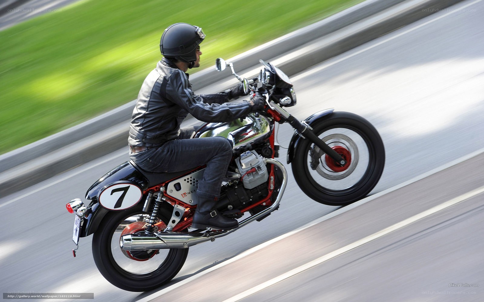 motorcyclist riding on road