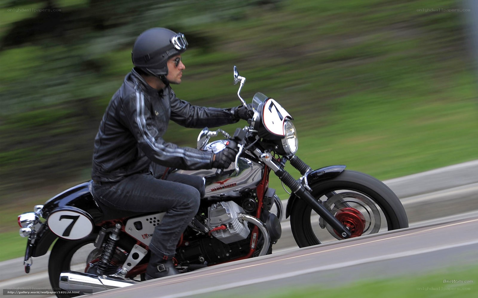 motorcyclist riding on road