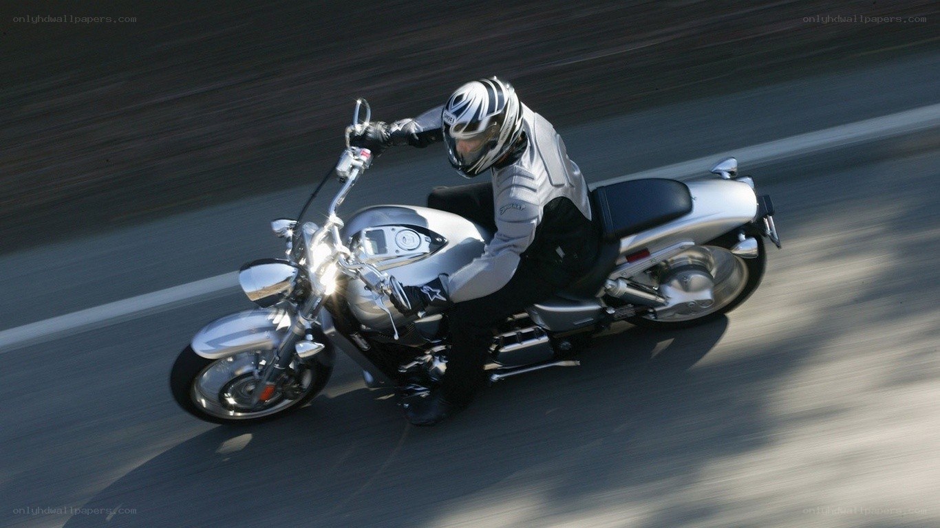 Motorcyclist riding on road