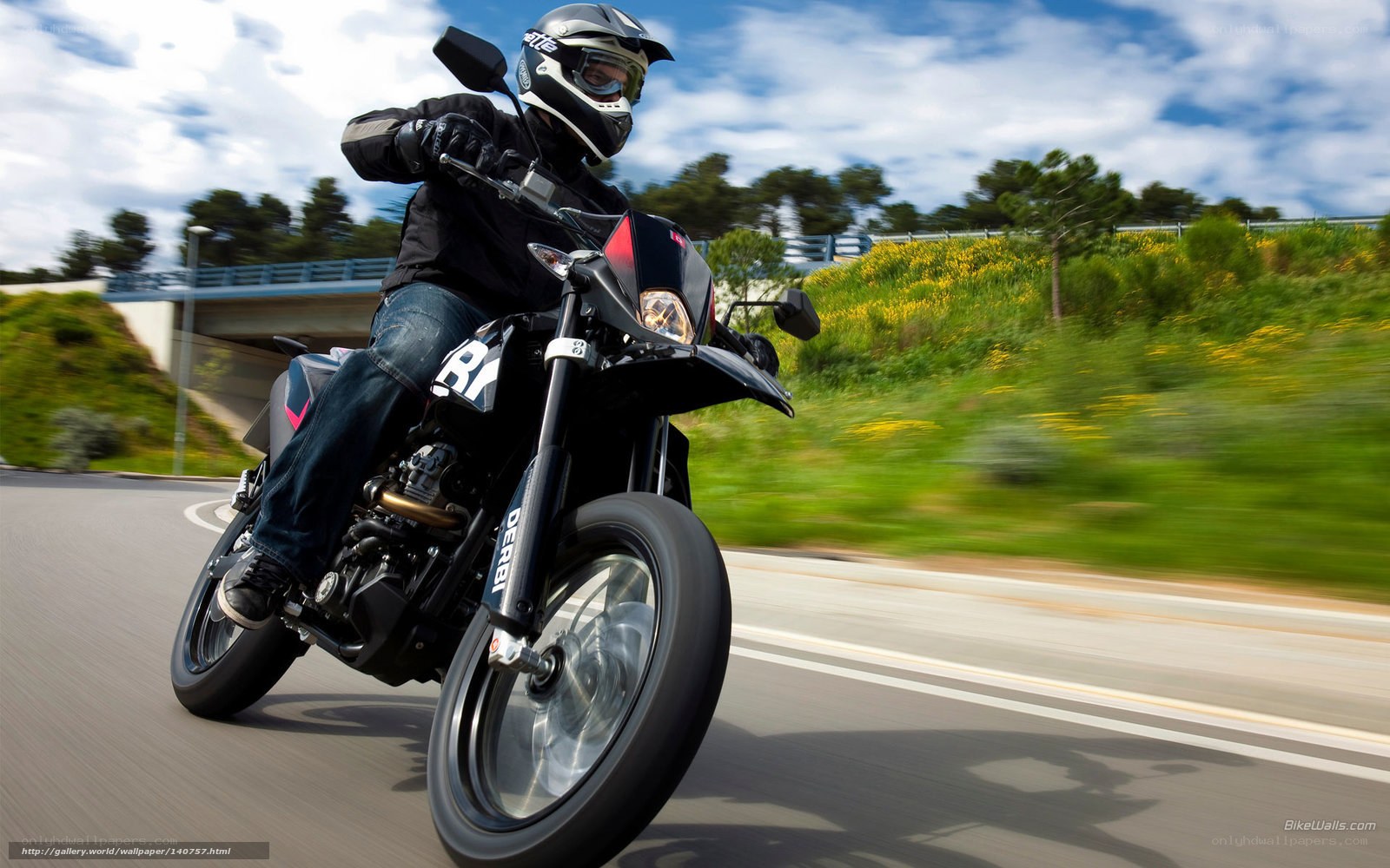 motorcyclist riding on road