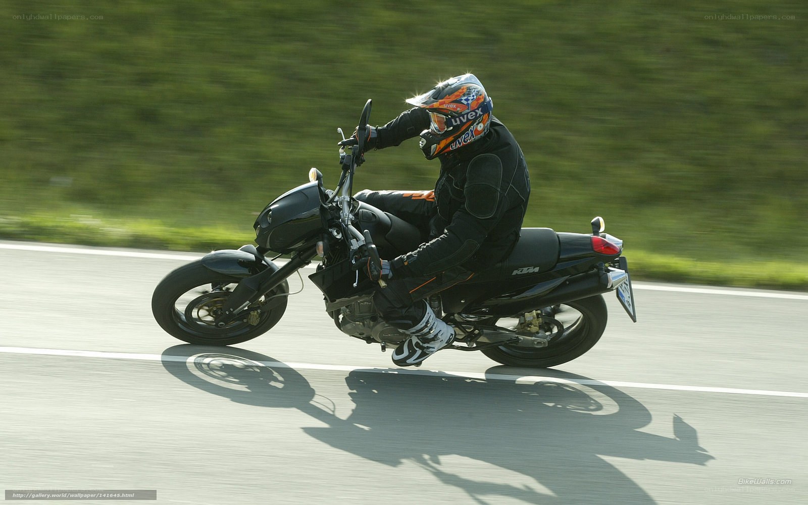 motorcyclist riding on road