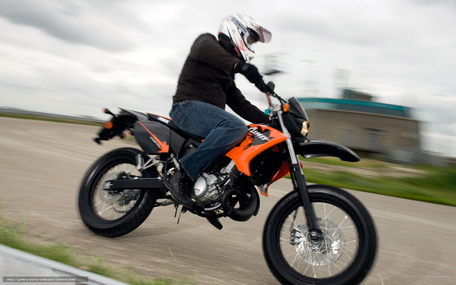 motorcyclist riding on track