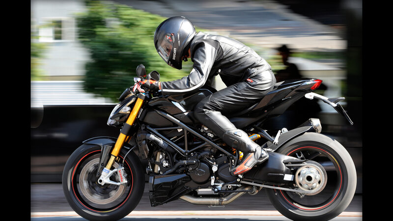 motorcyclist riding sport bike