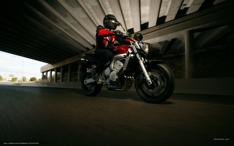 motorcyclist under overpass