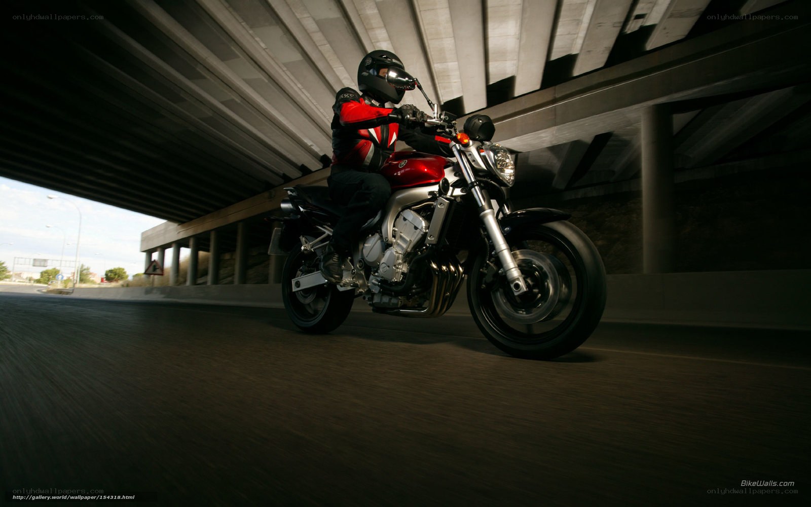 motorcyclist under overpass