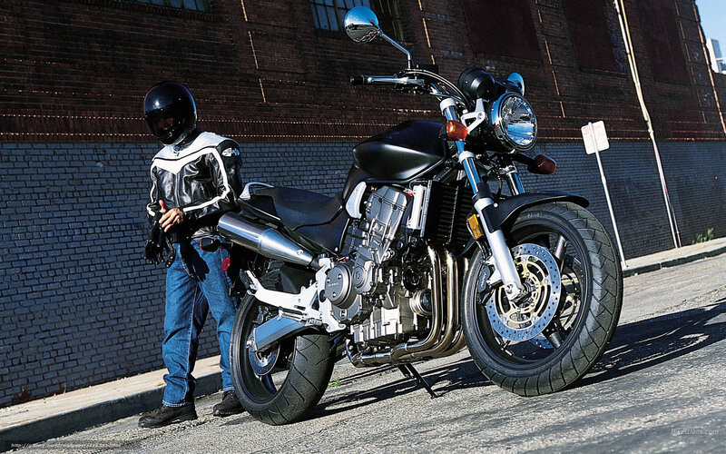 motorcyclist with black motorcycle