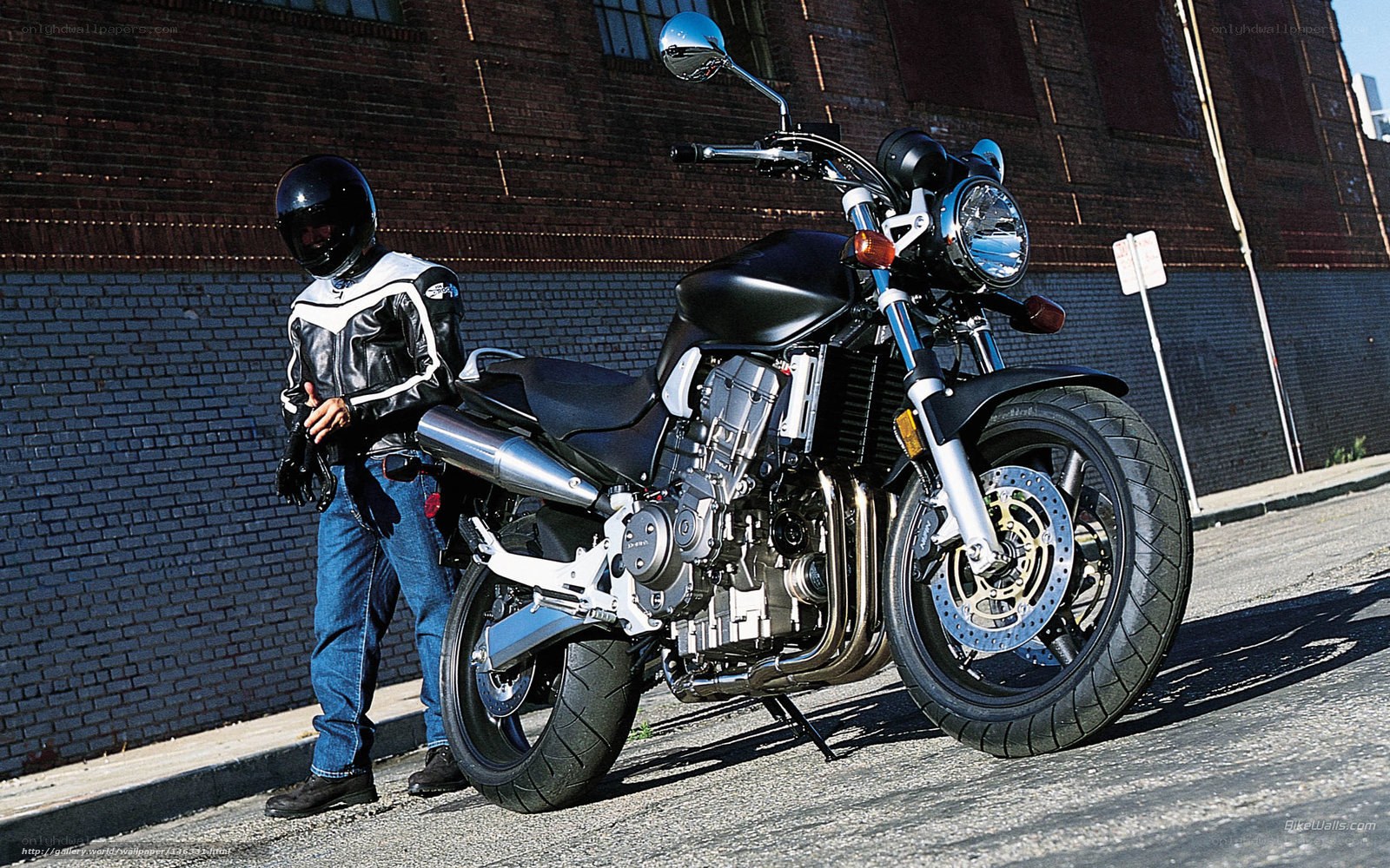 motorcyclist with black motorcycle