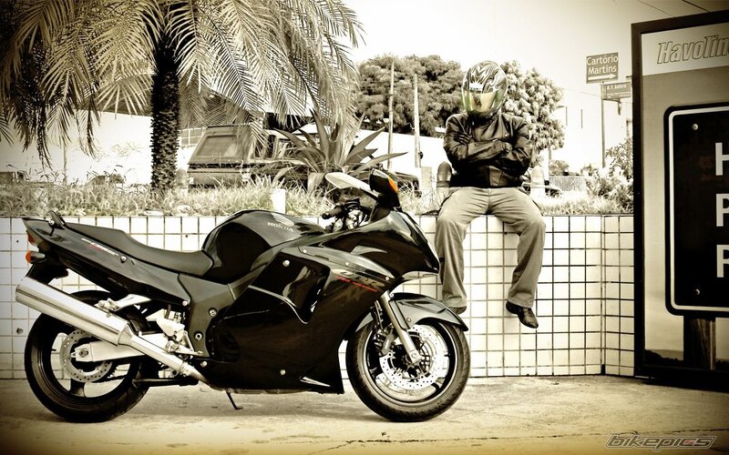 motorcyclist with helmet and bike
