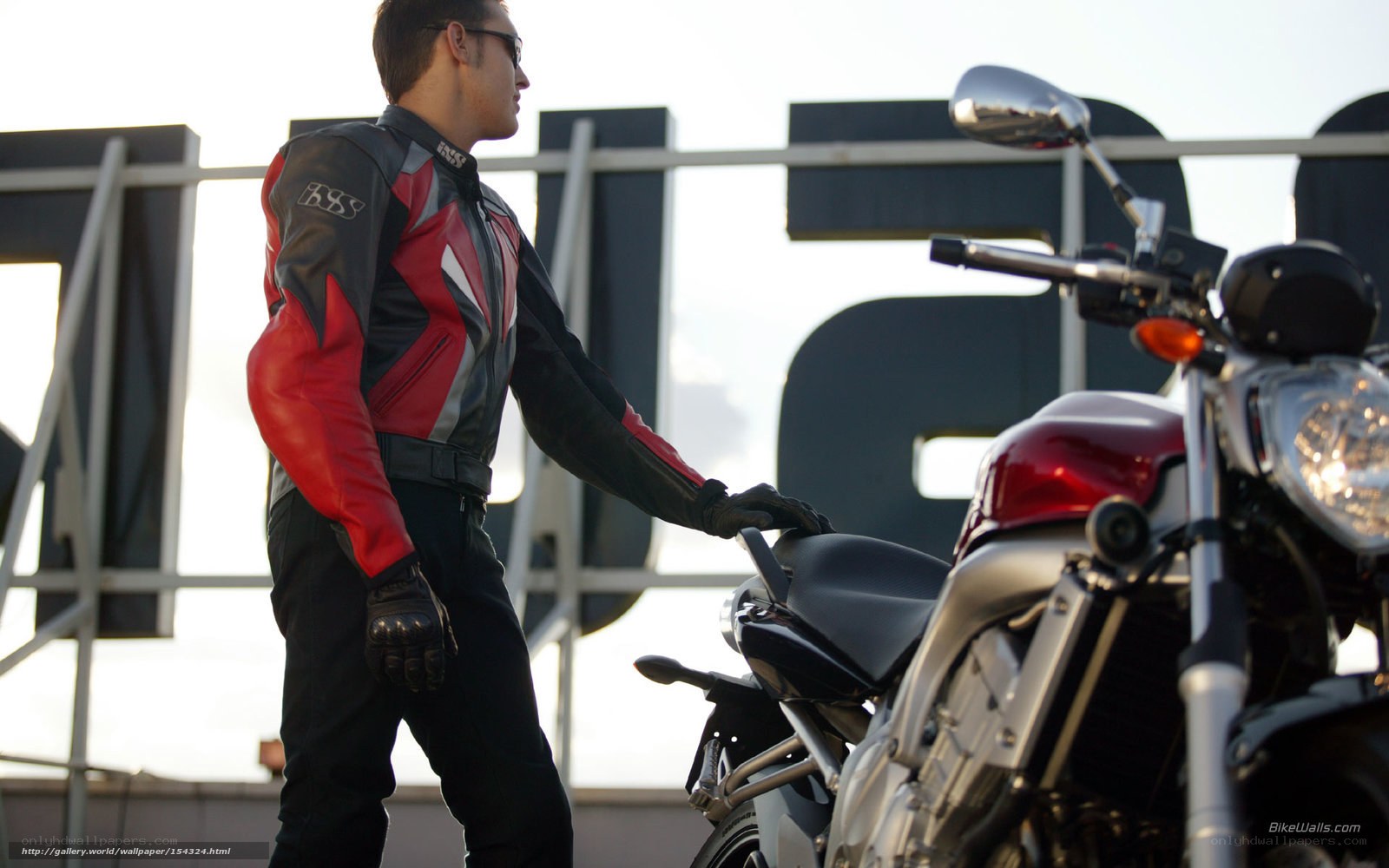 motorcyclist with red motorcycle