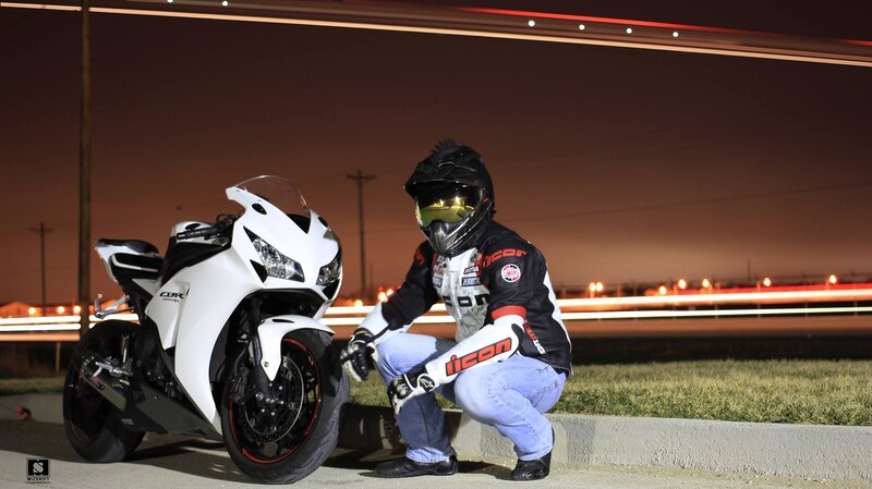Motorcyclist with White Motorcycle