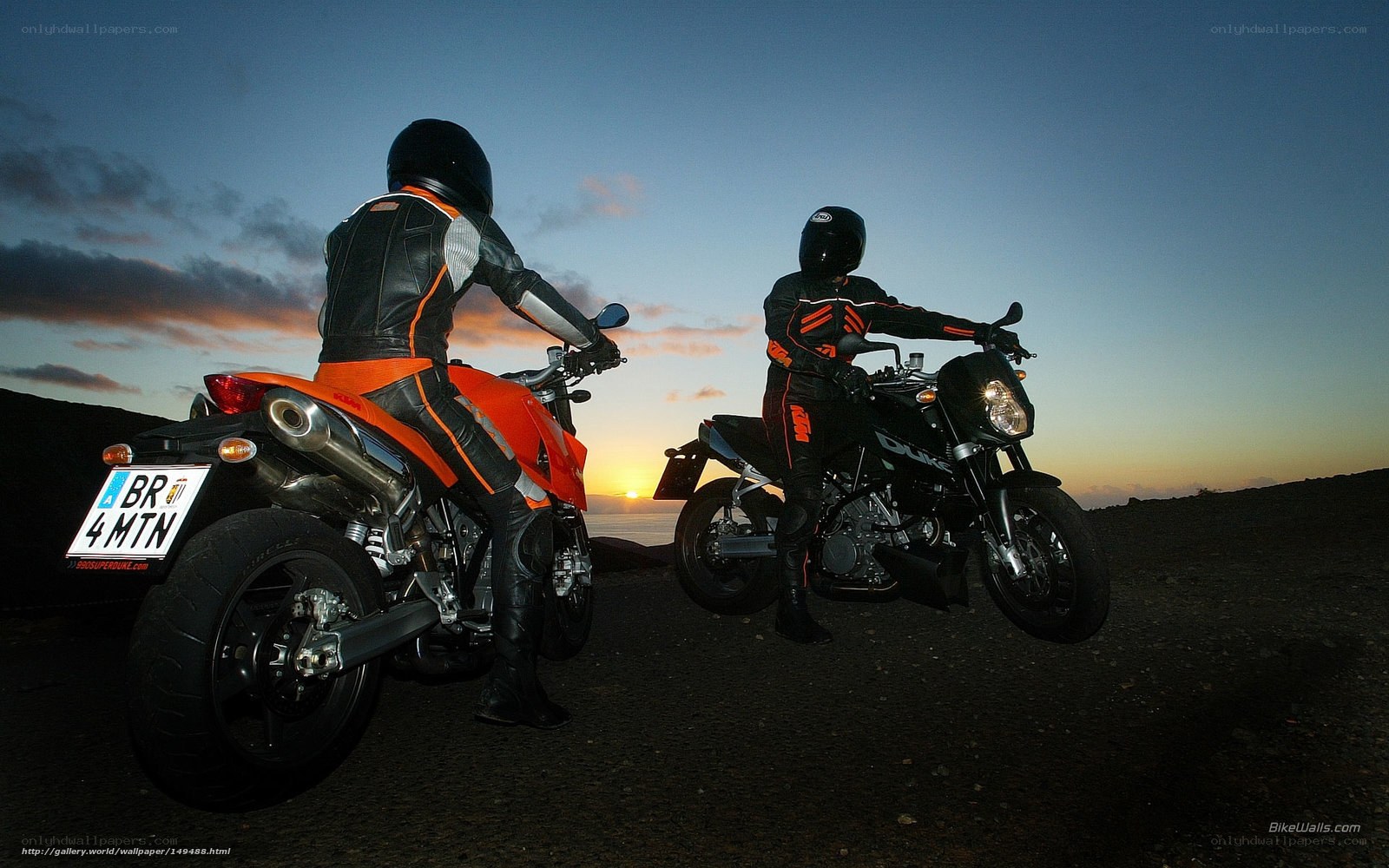 Motorcyclists at sunset