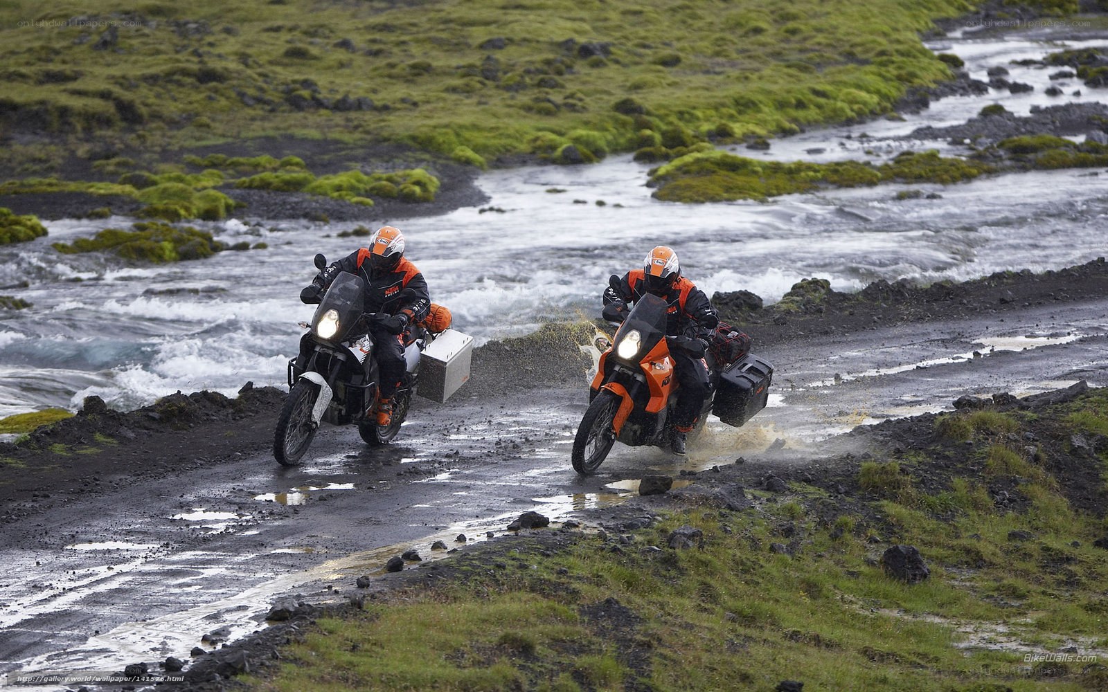 Motorcyclists crossing a river