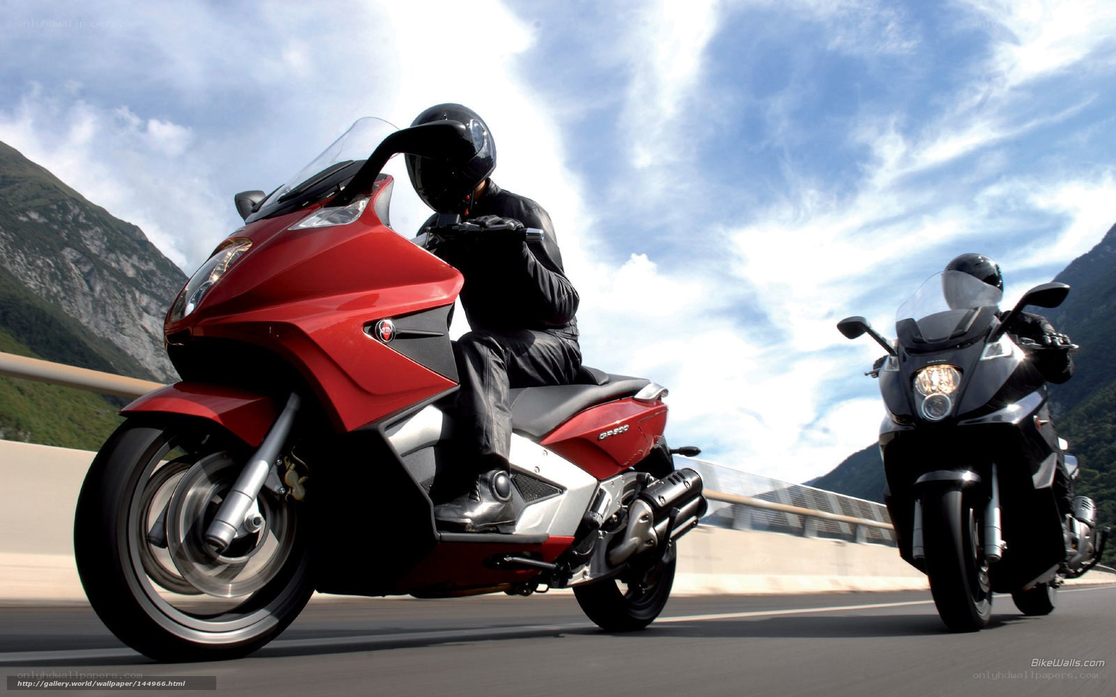 Motorcyclists on a mountain road