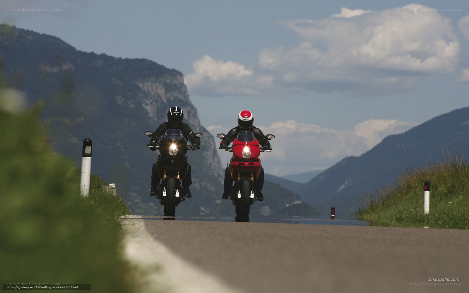 Motorcyclists on a mountain road