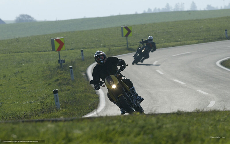 Motorcyclists on a winding road
