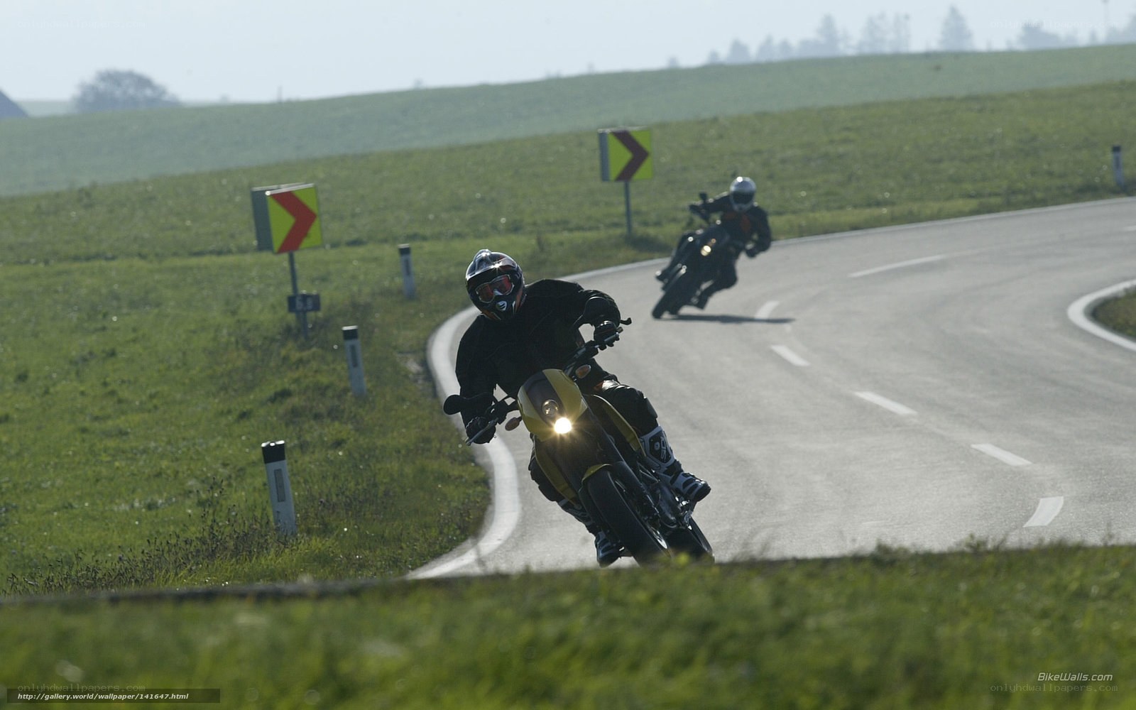Motorcyclists on a winding road