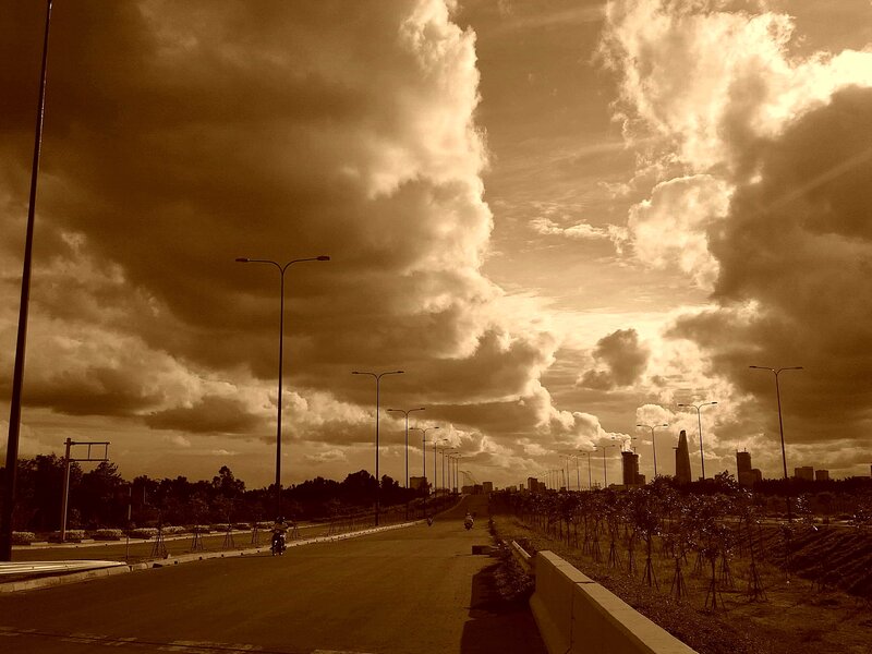 Motorcyclists on Highway — Brown