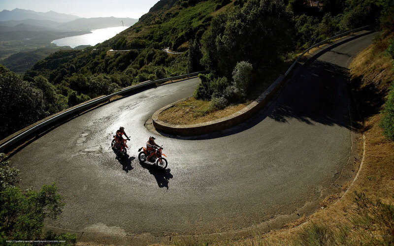 Motorcyclists on winding road