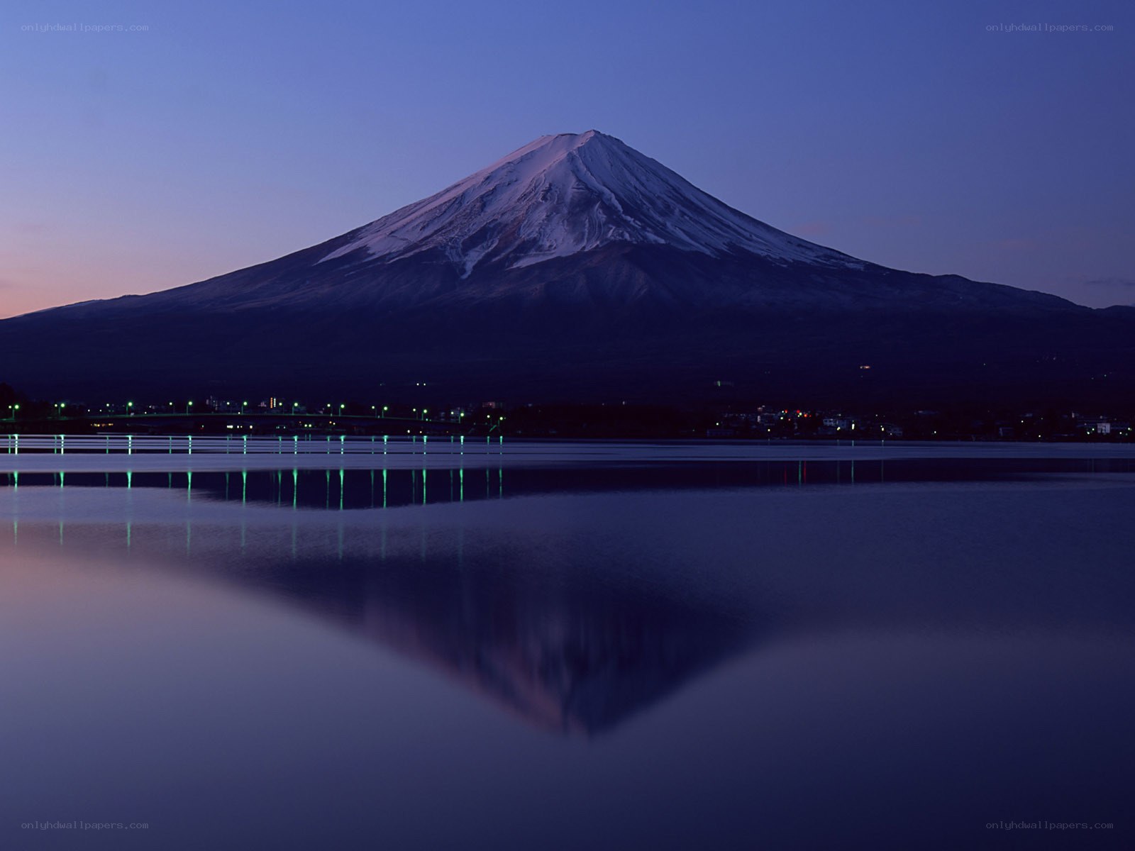 Mount Fuji at dusk with lake reflection