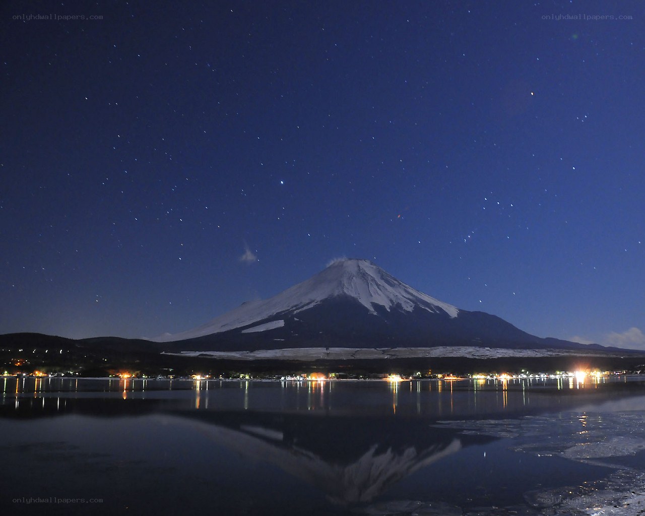 Mount Fuji at night with starry sky