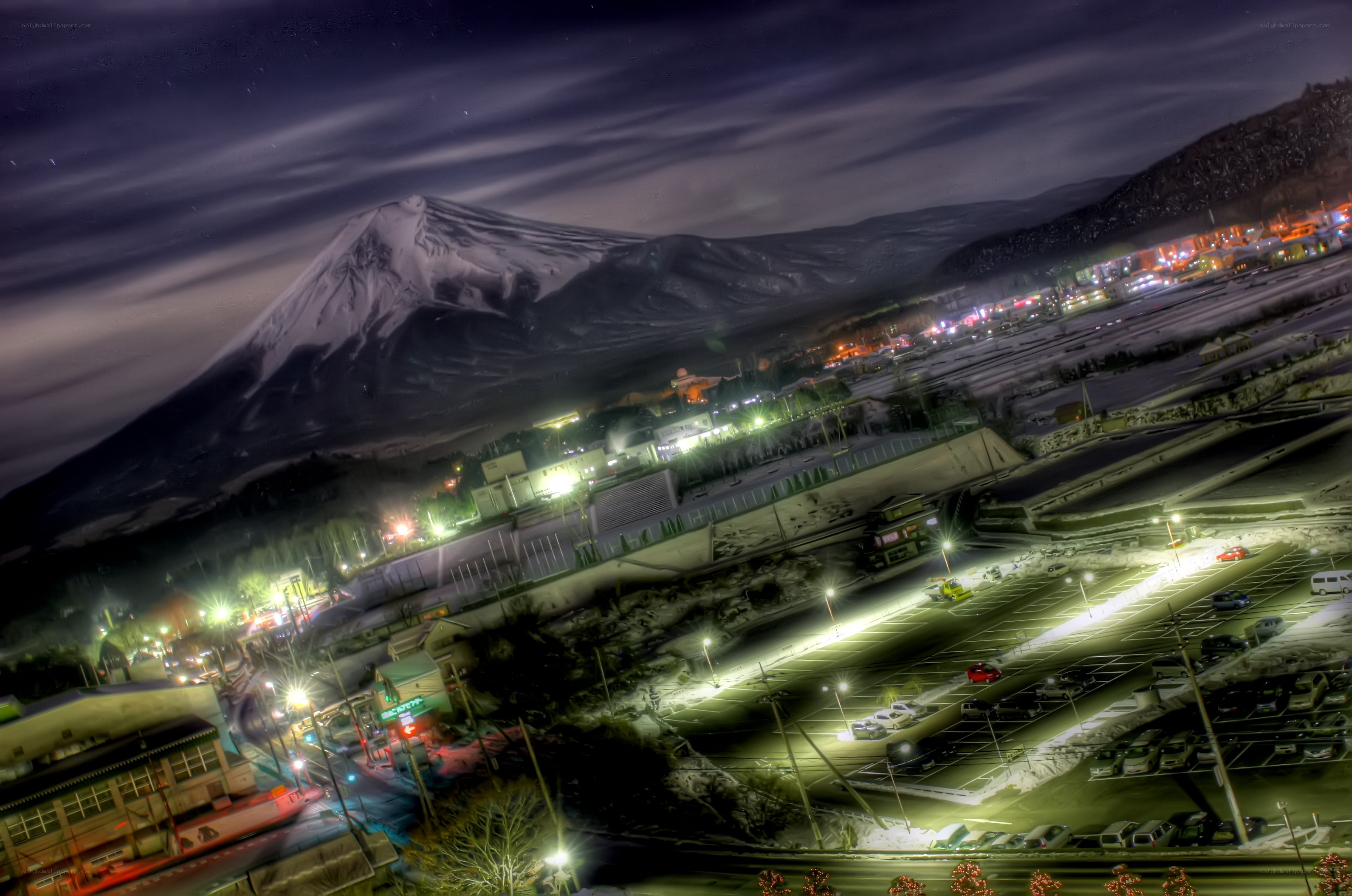 Mount Fuji at night with town