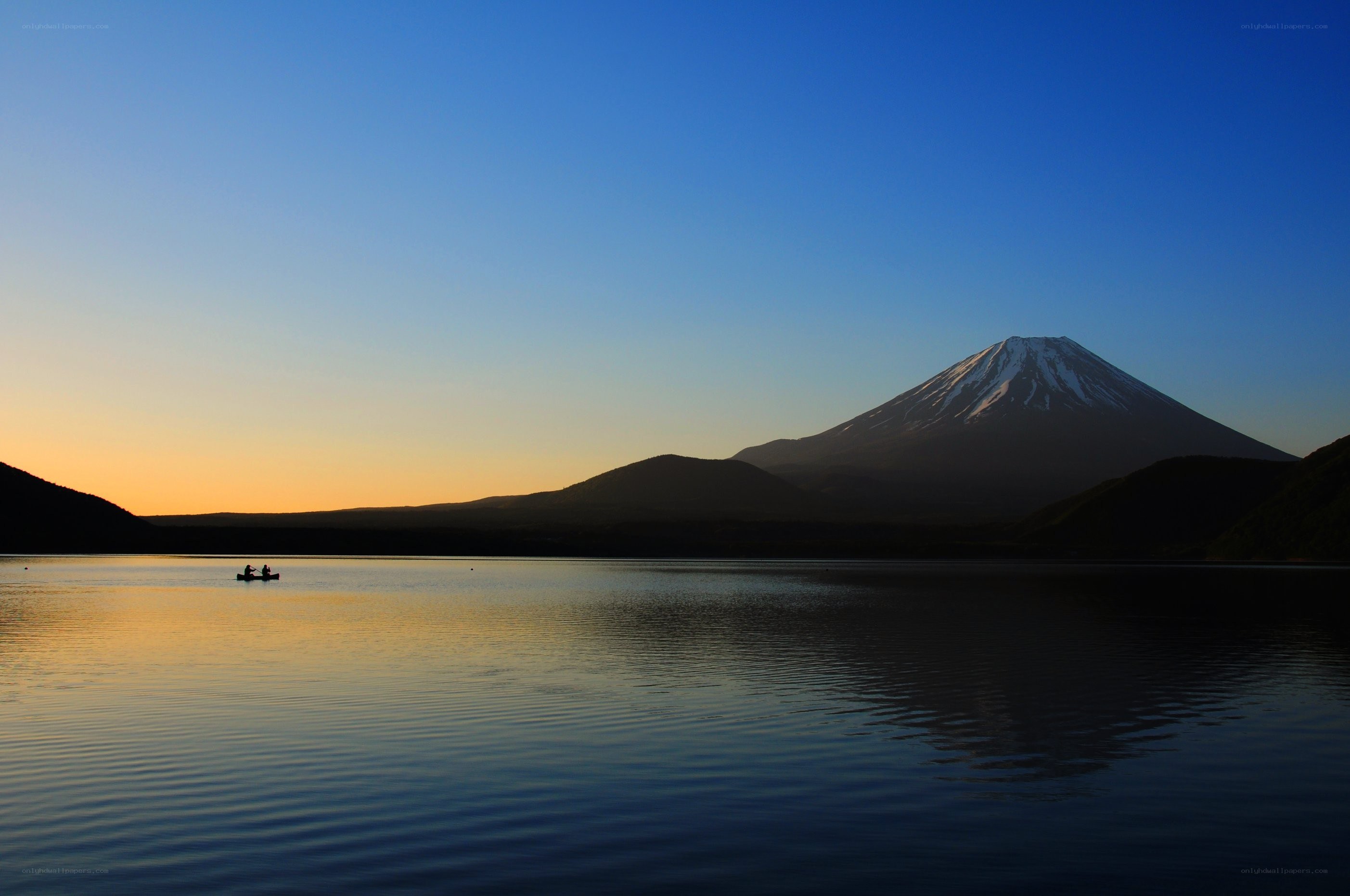 Mount Fuji at sunset with canoe