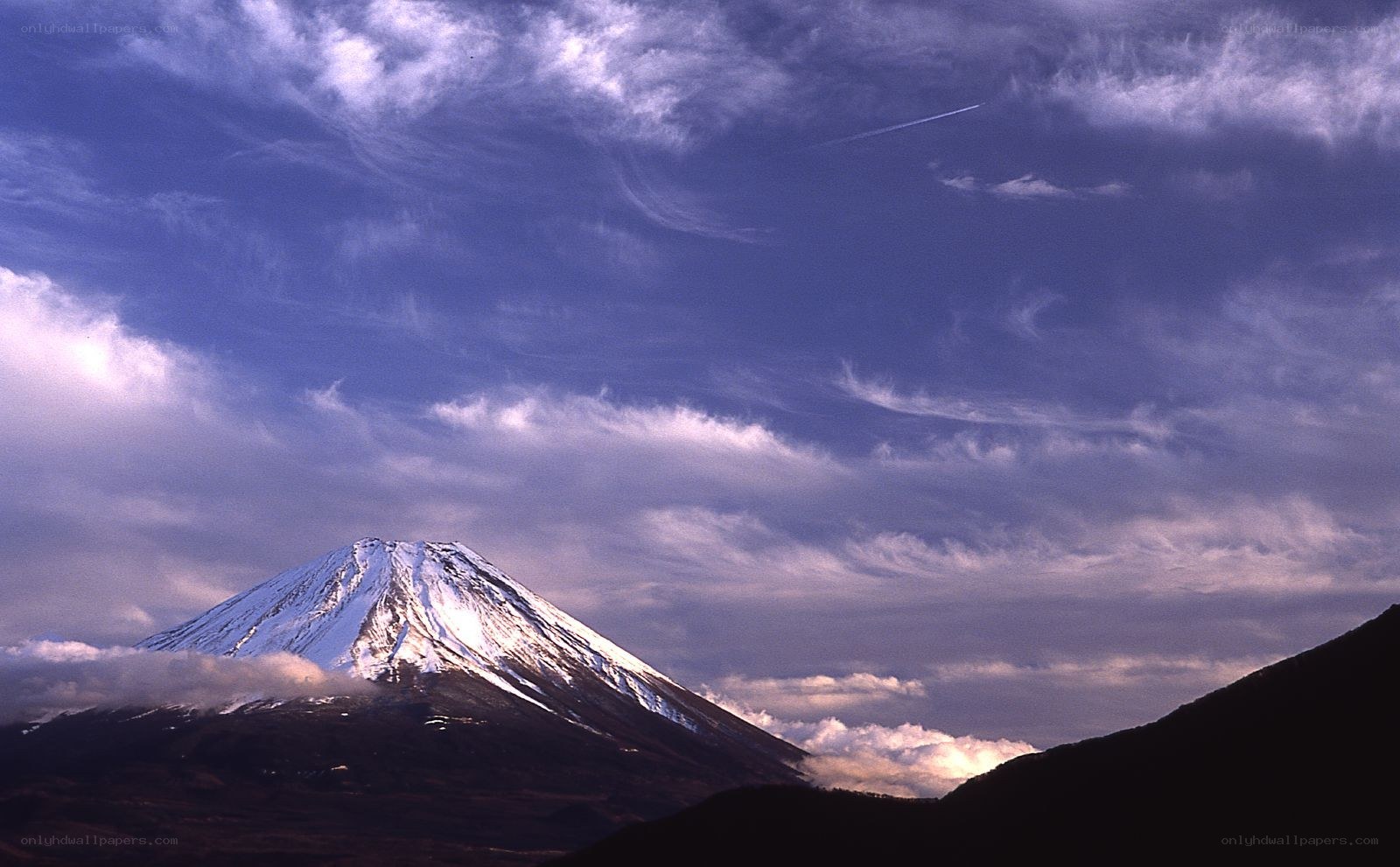 Mount Fuji under a cloudy sky