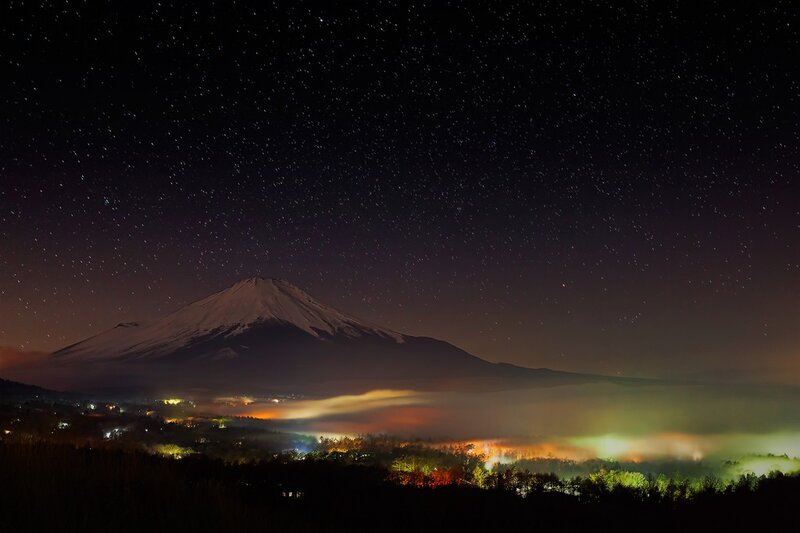 Mount Fuji under starry sky