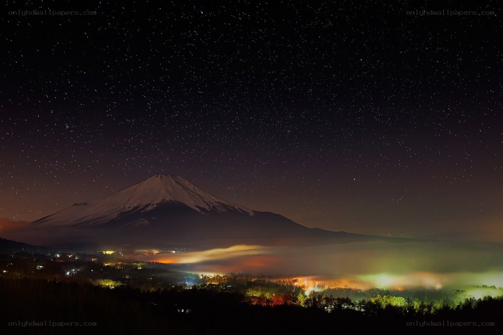 Mount Fuji under starry sky