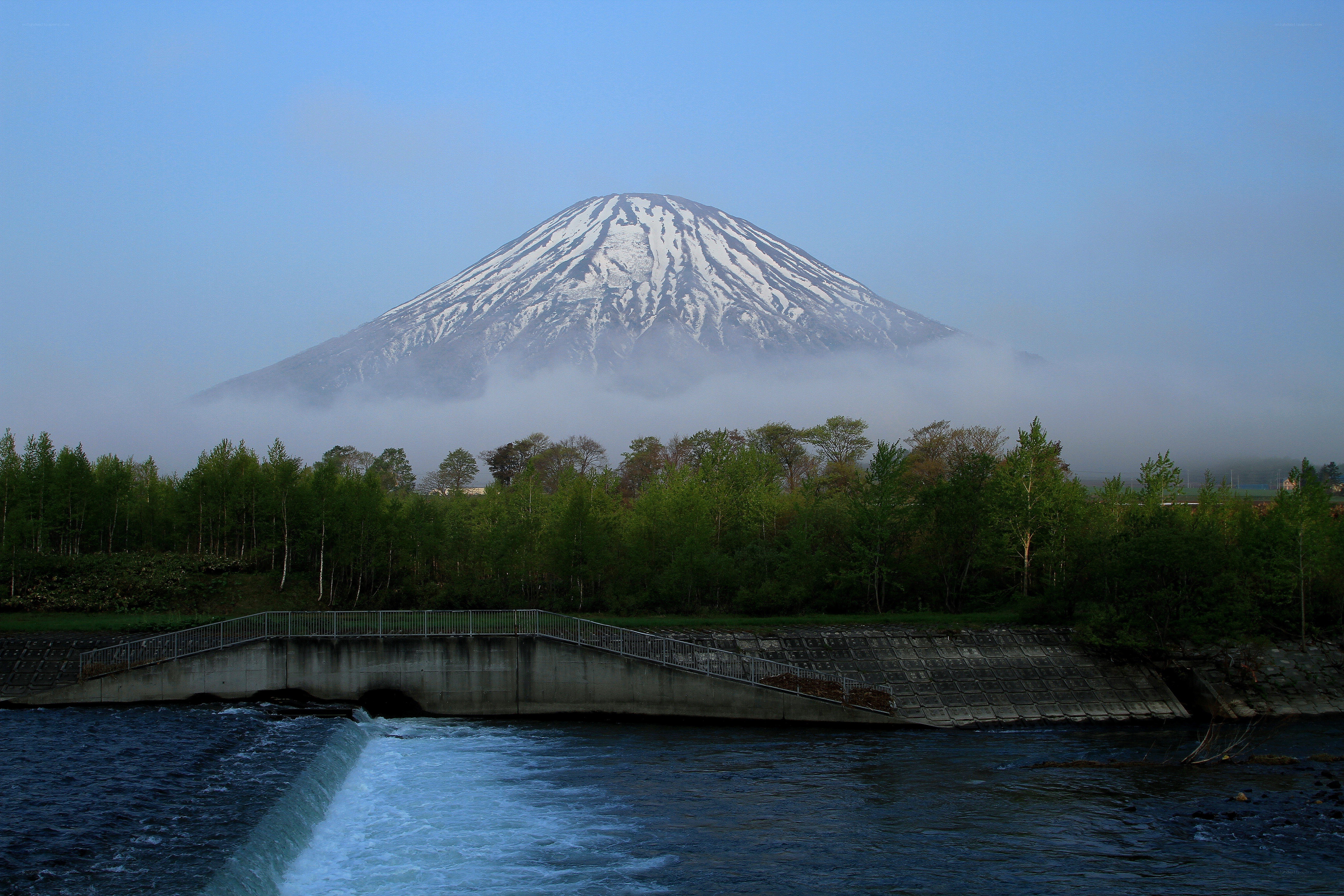 Mount Fuji with river and mist